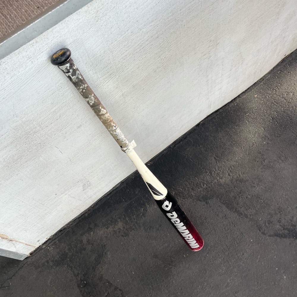 DeMarini Baseball Bat in Black and White